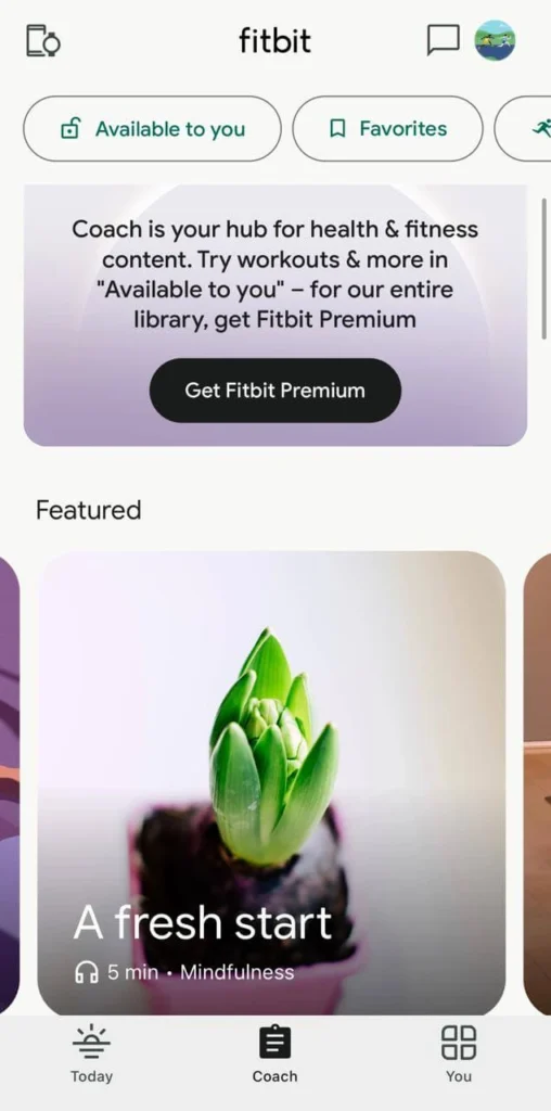 Fitbit app interface showcasing smart fitness apps for health tracking and guided workouts.

